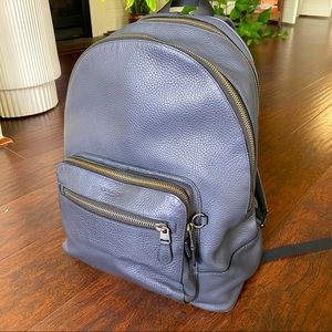 Coach Pebbled Blue Leather Backpack with adjustable straps and laptop pocket
